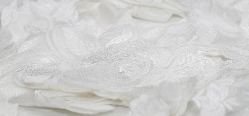 i tessuti e i materiali dell'abito da sposa